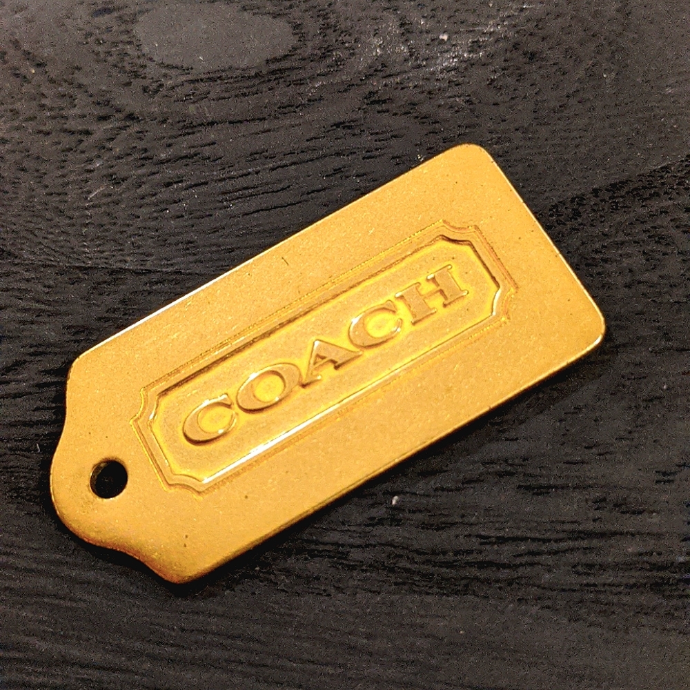 Coach metal Gold tag